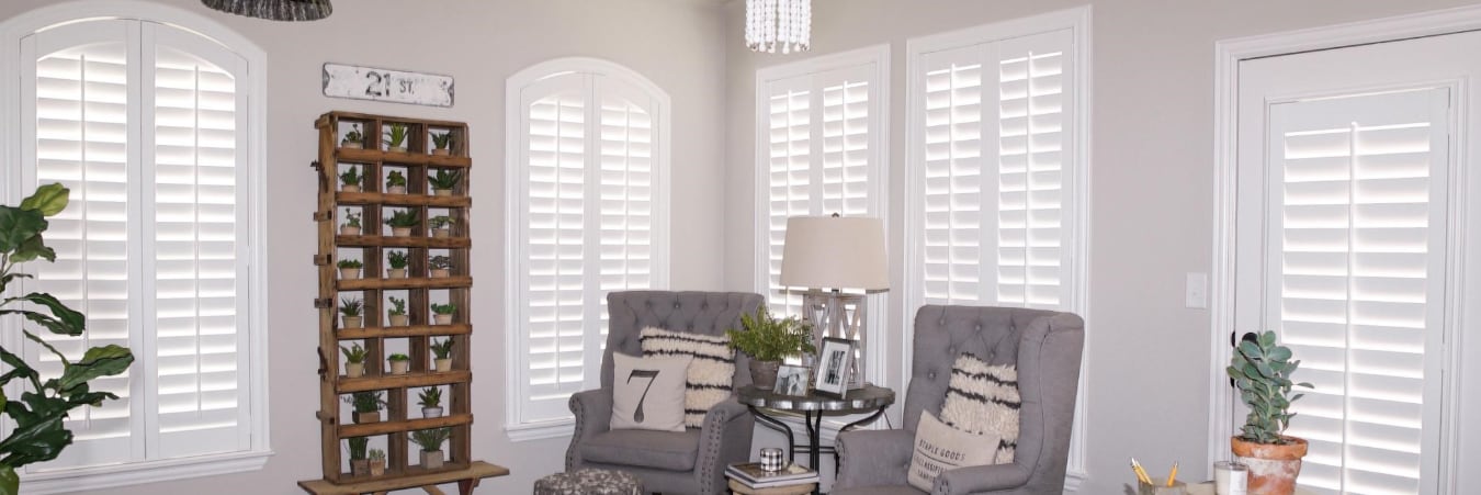 Plantation shutters over a couch
